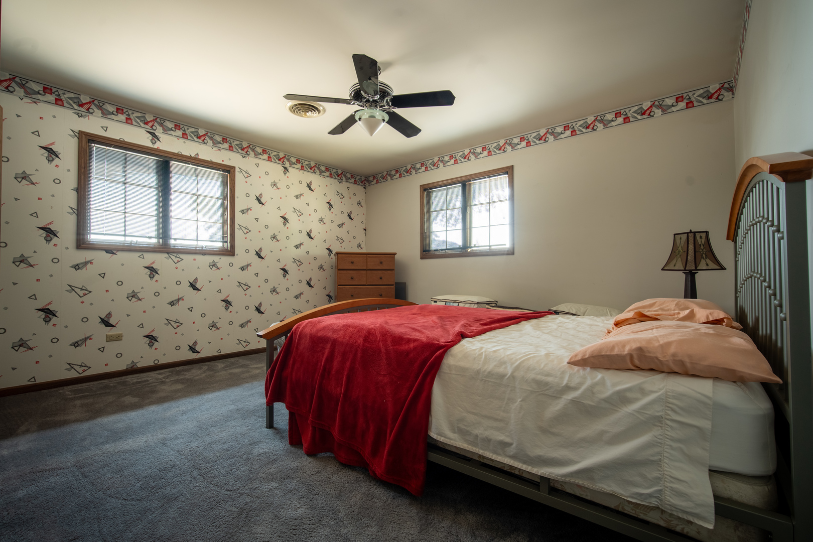 3065 182nd Place Lansing, IL 60438 - Photo 25 of 38 a bedroom with a bed and window