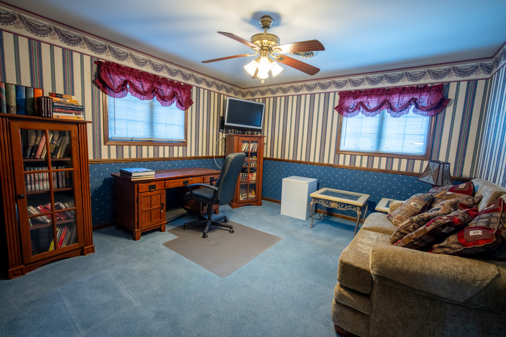 3065 182nd Place Lansing, IL 60438 - Photo 26 of 38 a bedroom with furniture and a flat screen tv