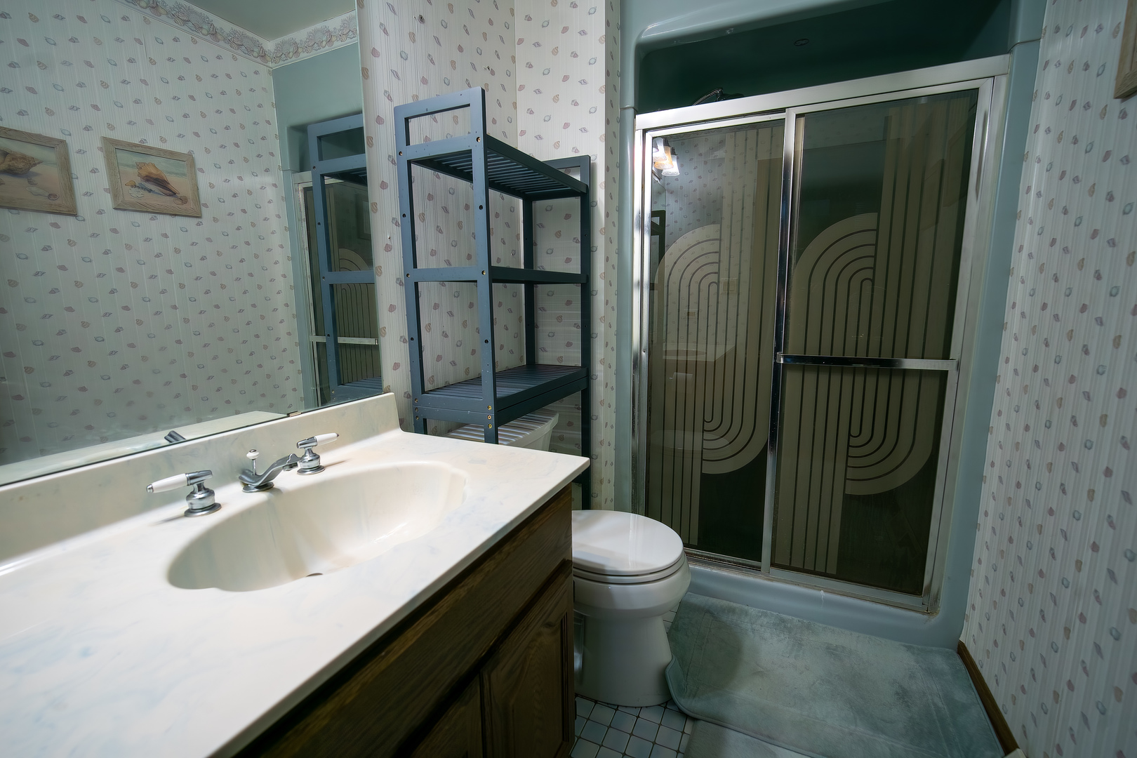 3065 182nd Place Lansing, IL 60438 - Photo 29 of 38 a bathroom with a sink toilet and shower