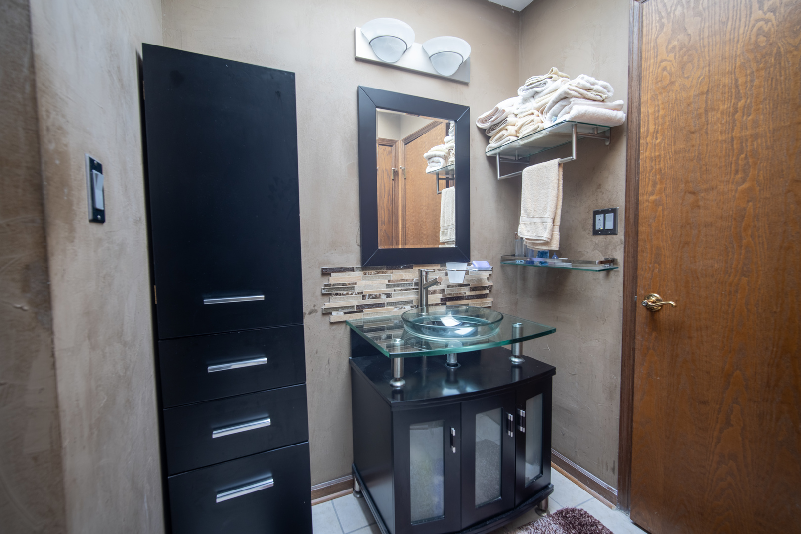 3065 182nd Place Lansing, IL 60438 - Photo 30 of 38 a bathroom with a sink and a mirror