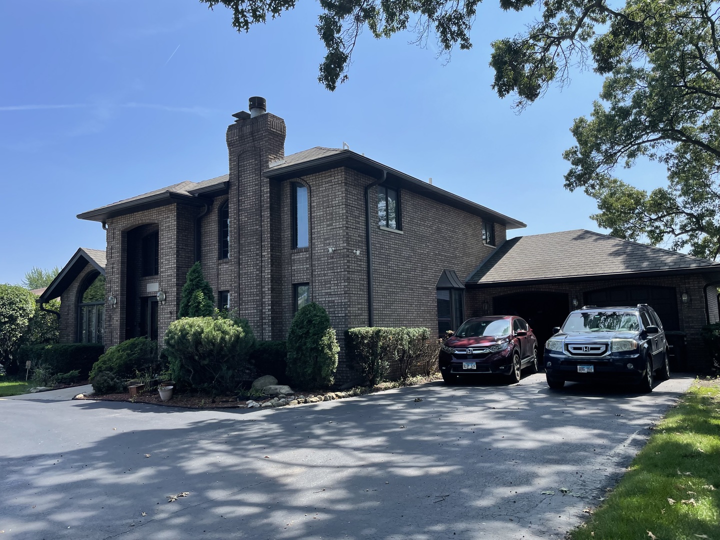 3065 182nd Place Lansing, IL 60438 - Photo 3 of 38 a car parked in front of a house