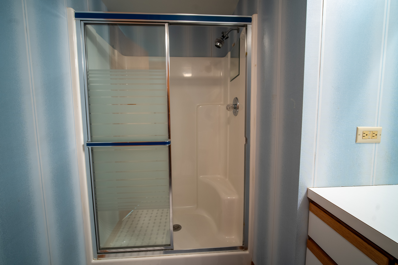 3065 182nd Place Lansing, IL 60438 - Photo 33 of 38 a bathroom with a glass shower door