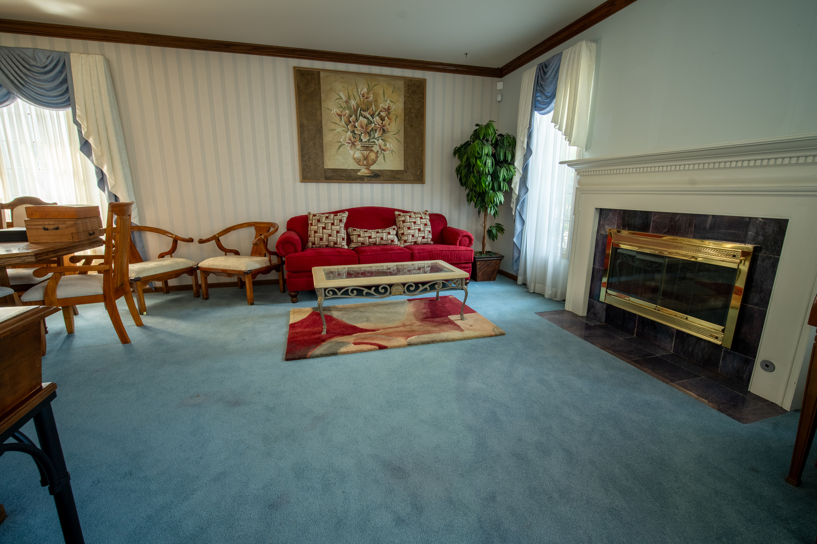 3065 182nd Place Lansing, IL 60438 - Photo 8 of 38 a living room with furniture and a fireplace
