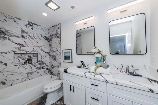 a view of a table and chairs in a room