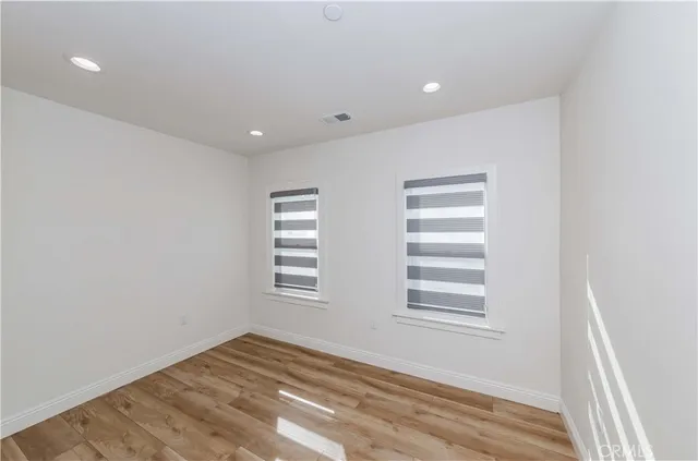 a view of a livingroom with wooden floor