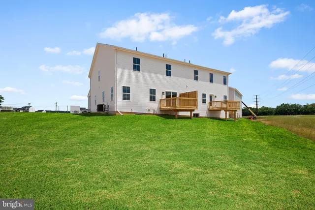 a front view of house with garden