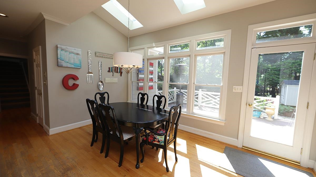 7525 Rainwater Road Raleigh, NC 27615 - Photo 6 of 30 Eat In Kitchen that Overlooks the Large Backyard and Deck