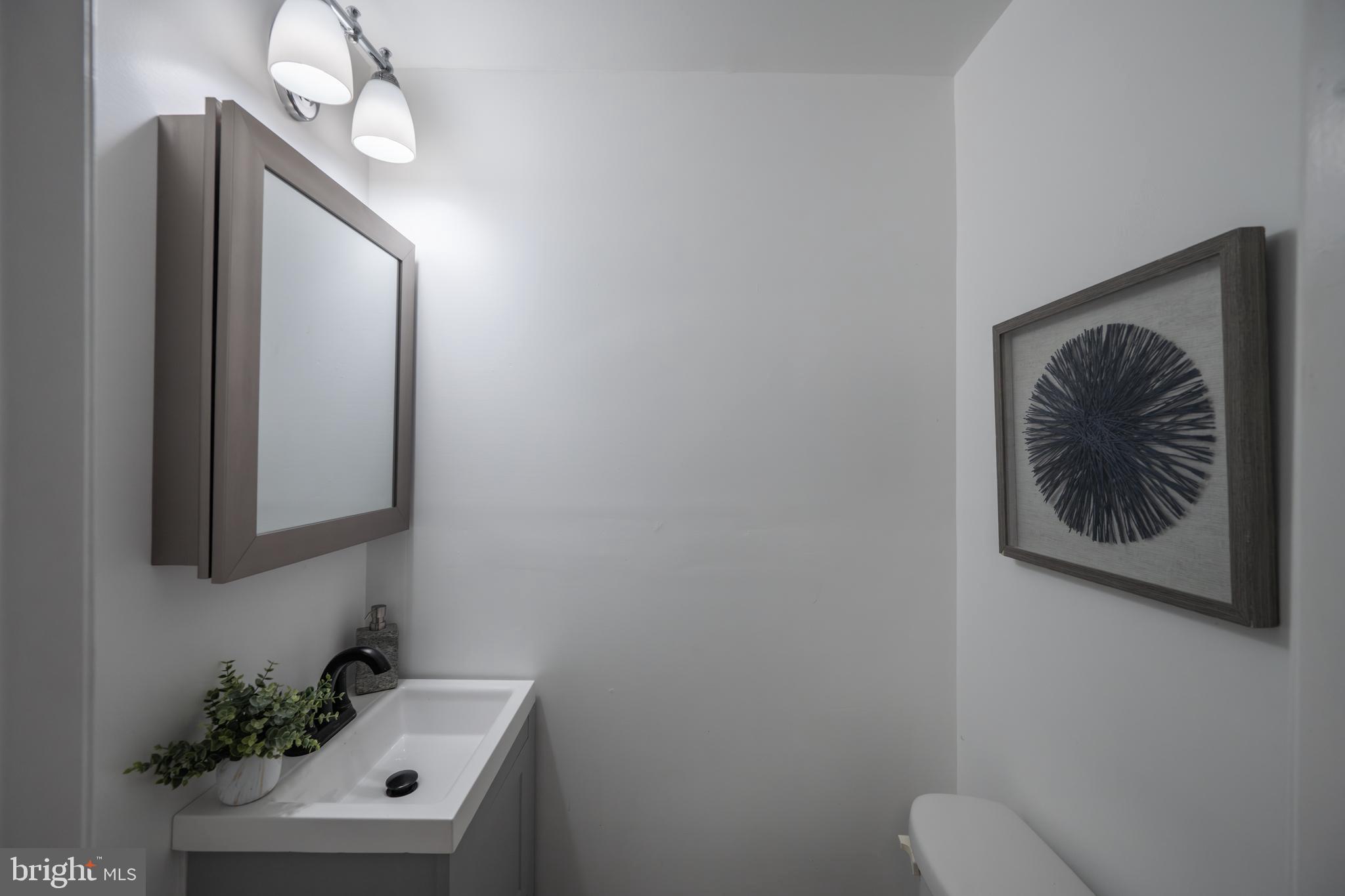 1028 West Cross Street Baltimore, MD 21230 - Photo 13 of 31 Main floor powder room