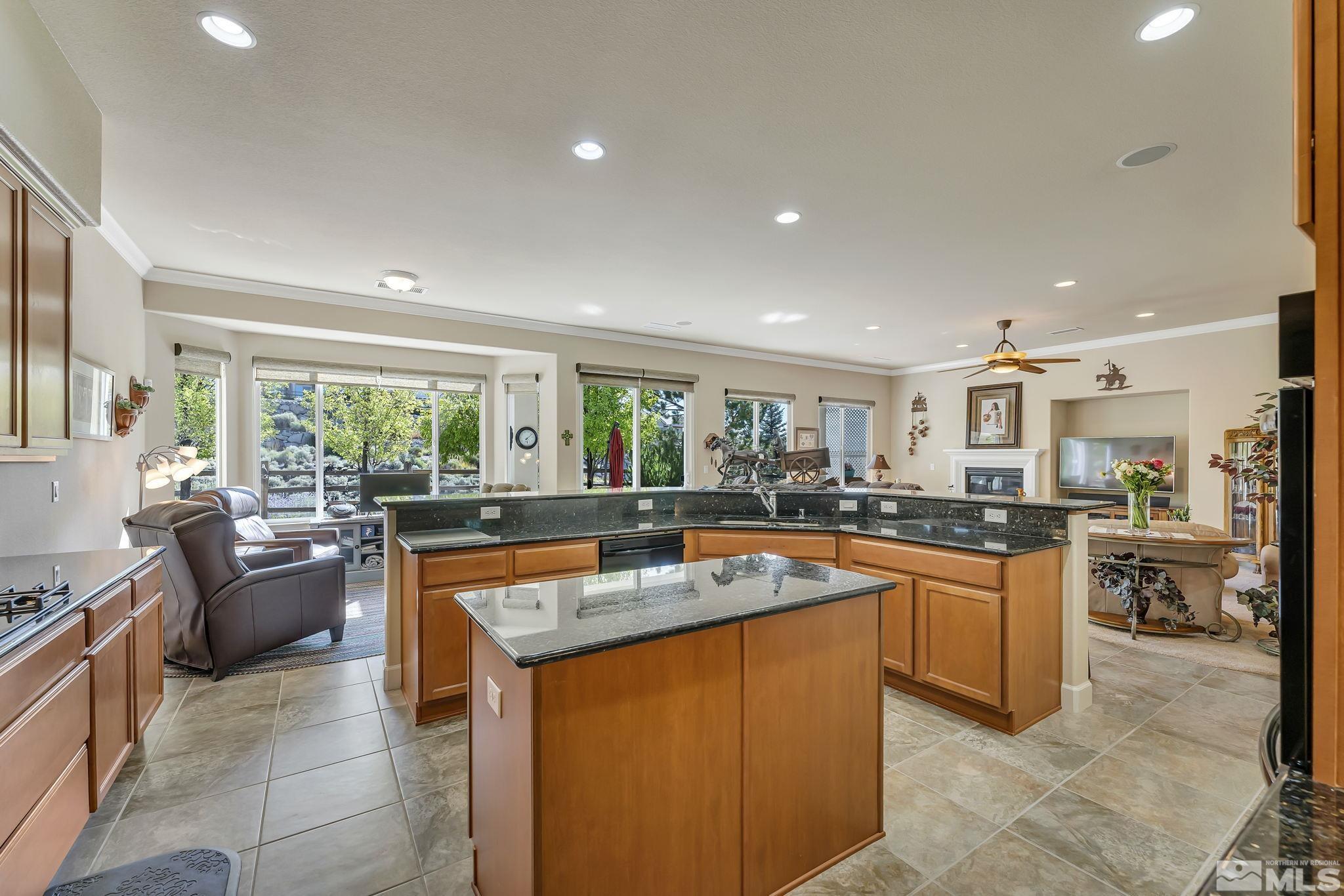 1320 Winterchase Way Reno, NV 89523 - Photo 16 of 37 a dining hall with stainless steel appliances granite countertop lots of counter top space