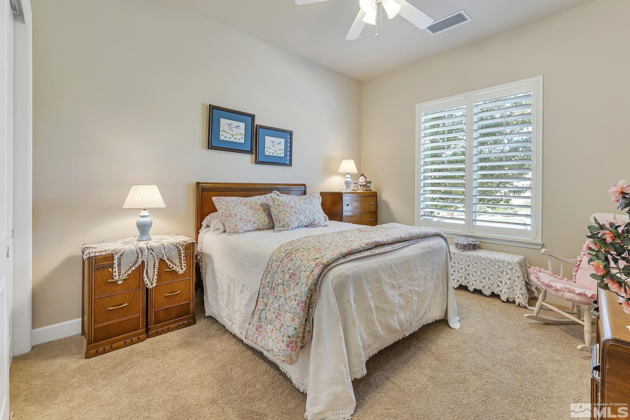 1320 Winterchase Way Reno, NV 89523 - Photo 24 of 37 a bedroom with a bed and a window