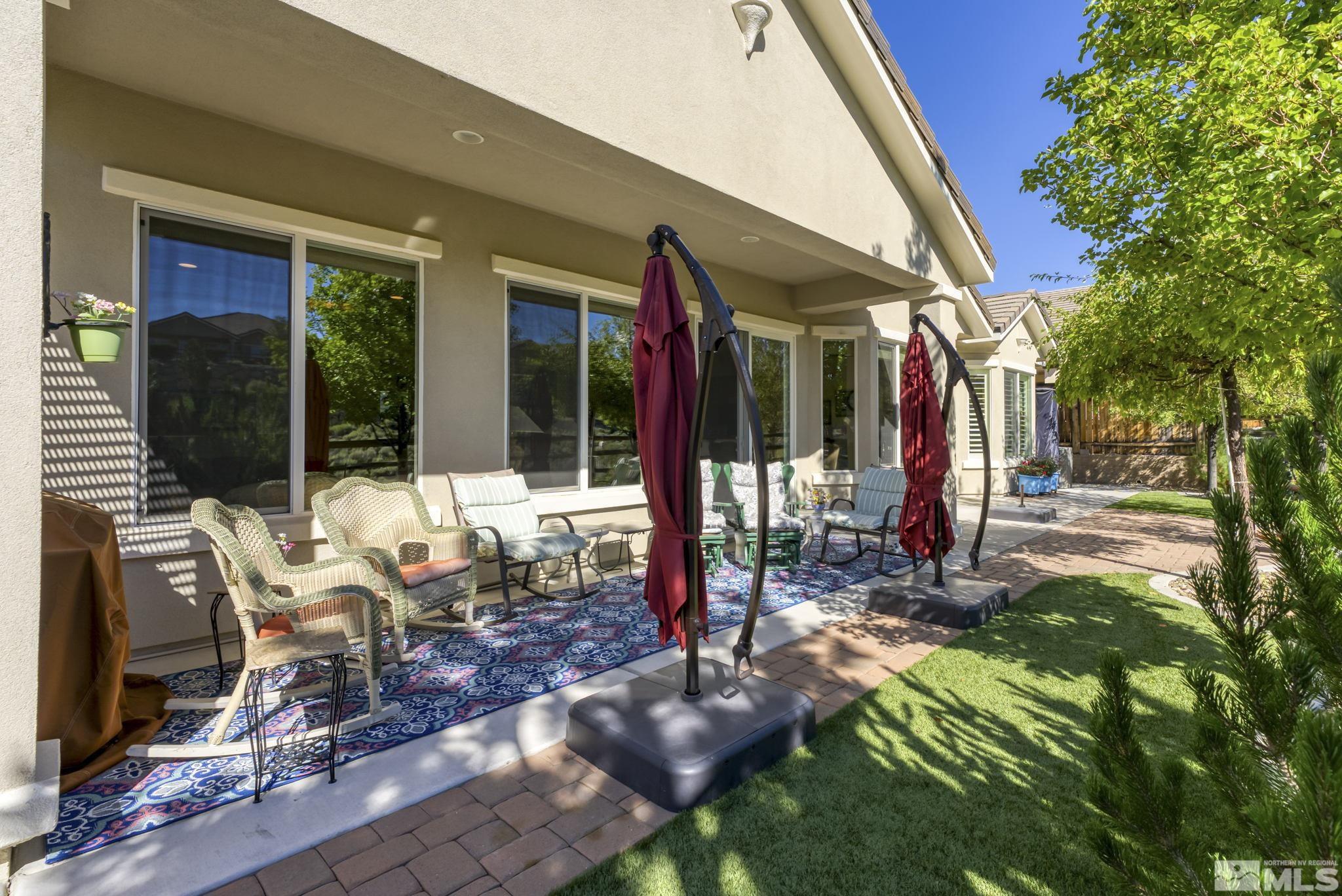 1320 Winterchase Way Reno, NV 89523 - Photo 34 of 37 a view of a house with backyard porch and sitting area