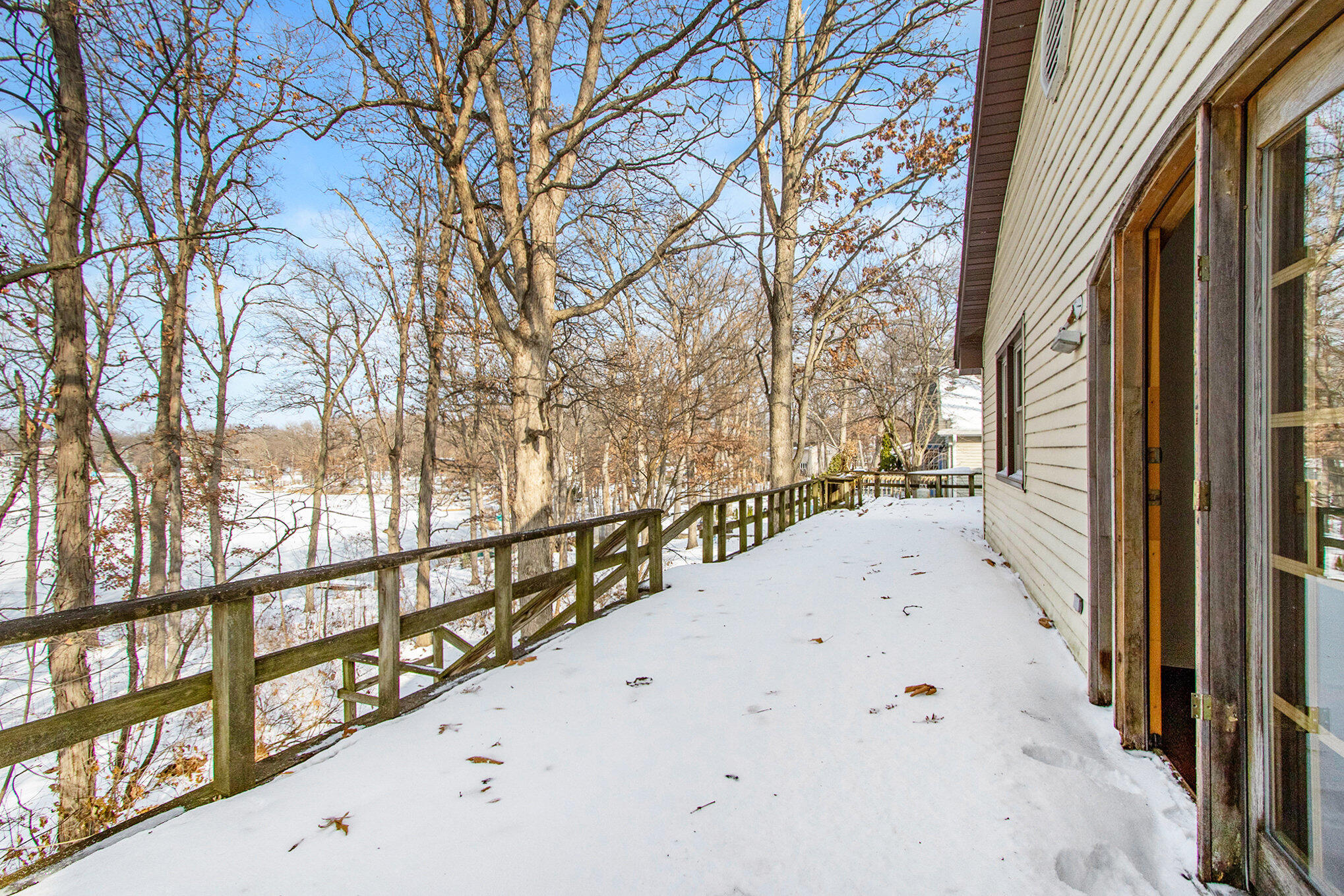 2091 Hidden Valley Drive Crown Point, IN 46307 - Photo 15 of 38 a view of balcony with wooden floor