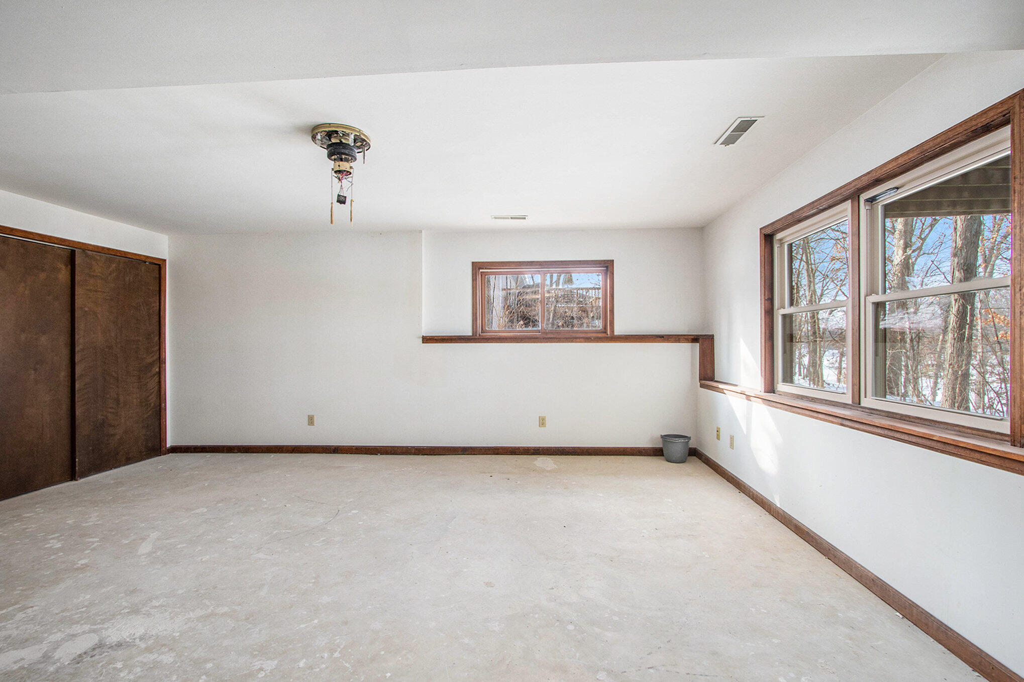 2091 Hidden Valley Drive Crown Point, IN 46307 - Photo 17 of 38 an empty room with a empty space and windows