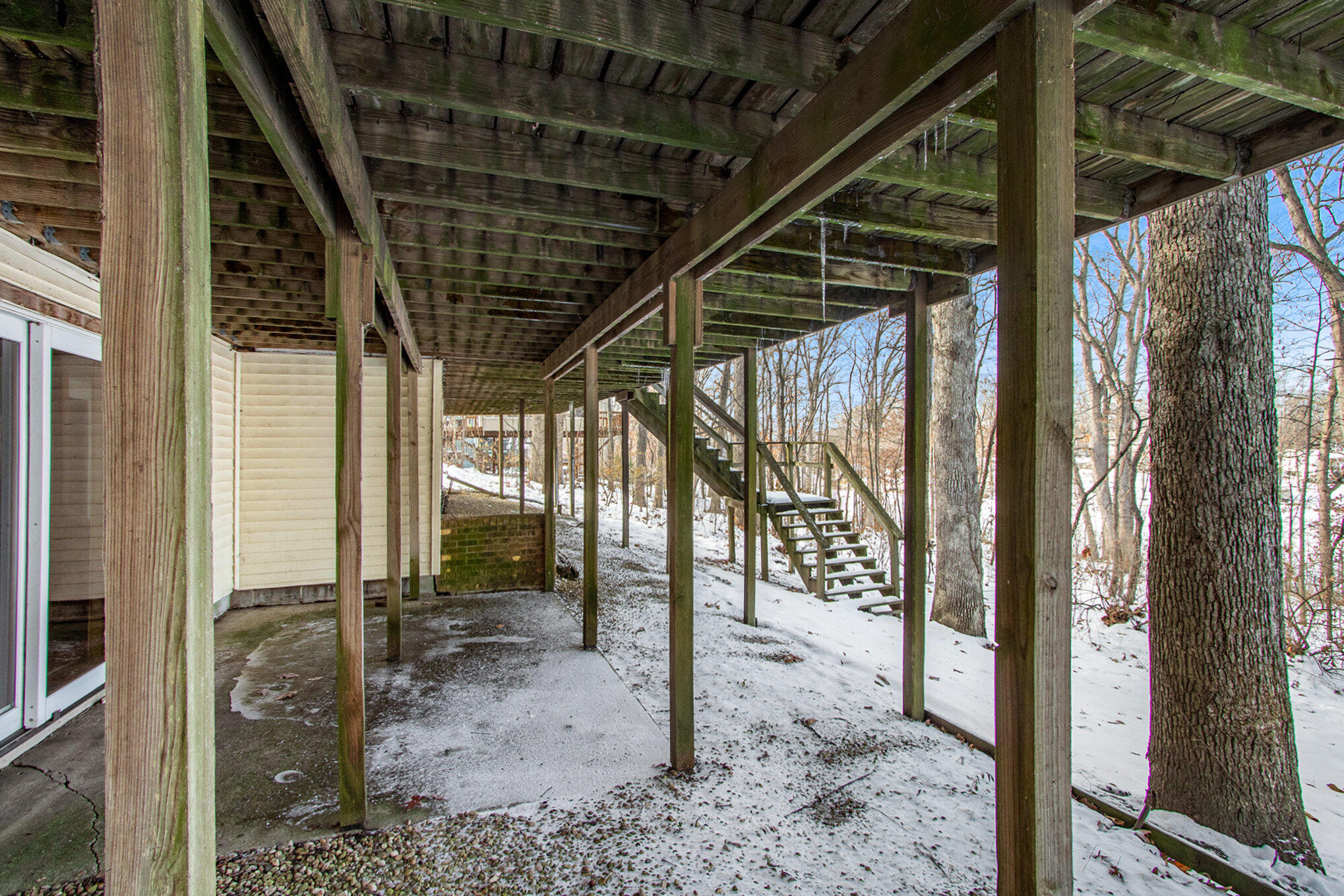 2091 Hidden Valley Drive Crown Point, IN 46307 - Photo 23 of 38 a view of a porch with a door