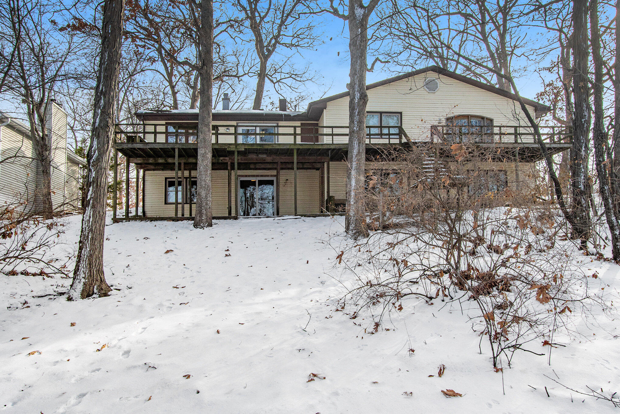 2091 Hidden Valley Drive Crown Point, IN 46307 - Photo 24 of 38 a view of a house with a snow in the yard
