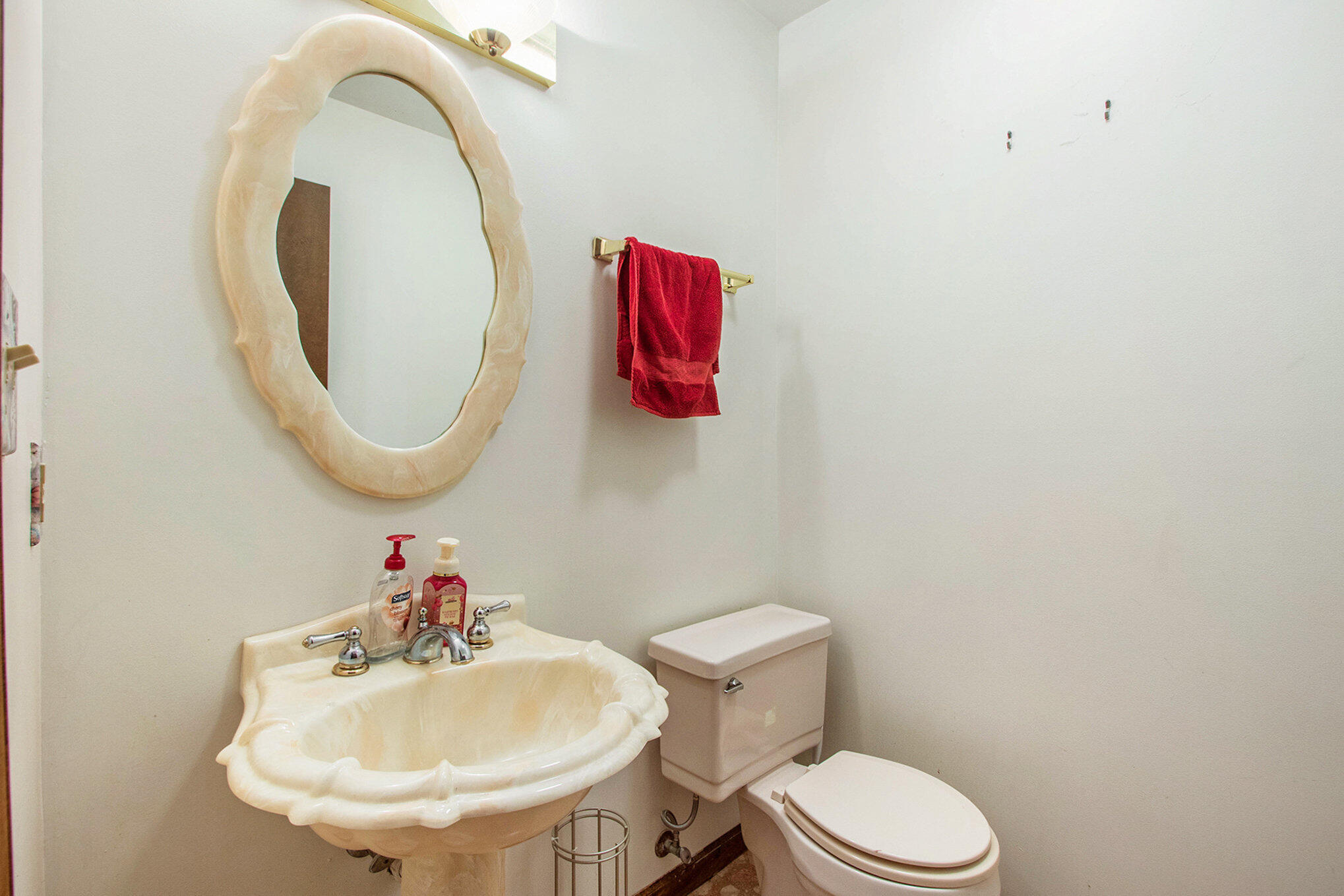 2091 Hidden Valley Drive Crown Point, IN 46307 - Photo 8 of 38 a bathroom with a sink and a mirror