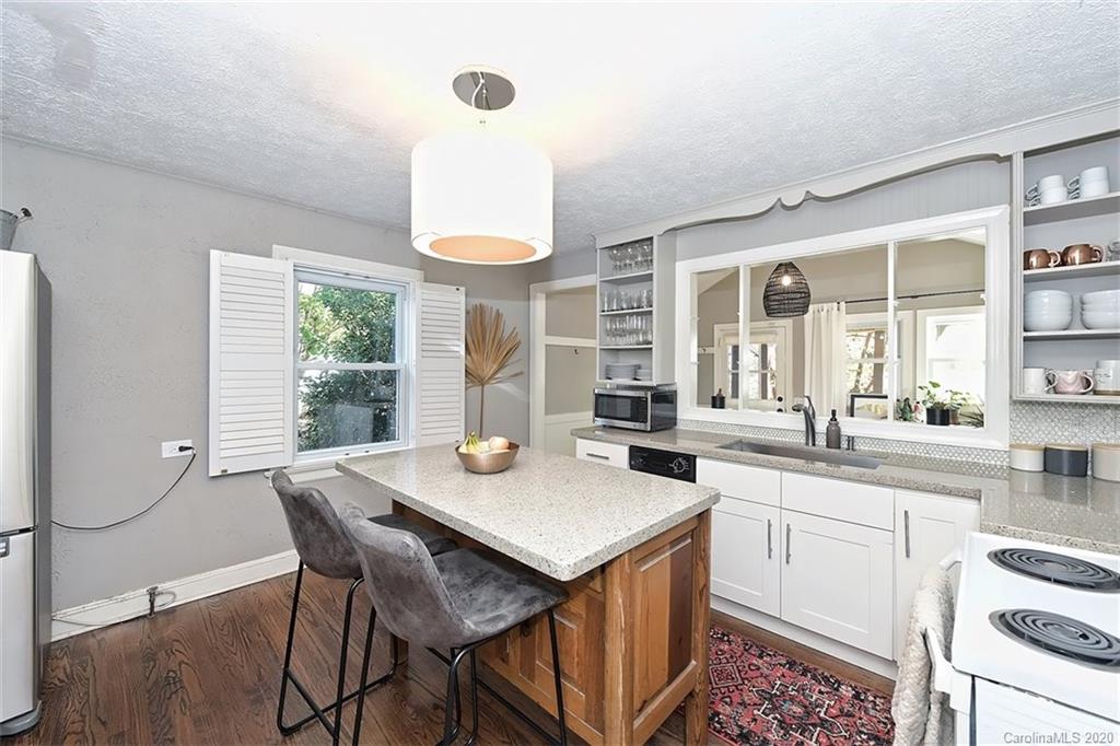 1508 Chippendale Road Charlotte, NC 28205 - Photo 11 of 28 a view of a kitchen counter space a sink and appliances