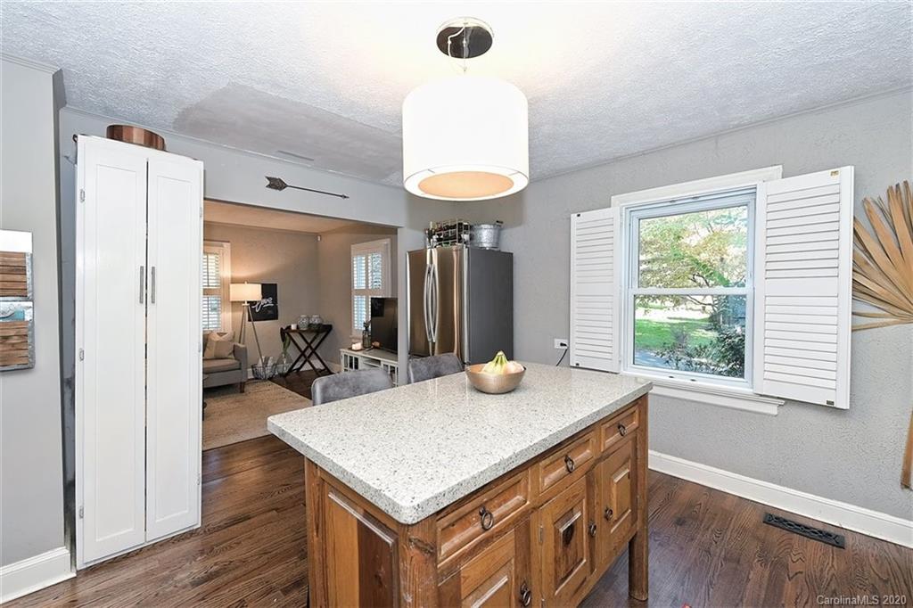 1508 Chippendale Road Charlotte, NC 28205 - Photo 12 of 28 a kitchen with sink and refrigerator