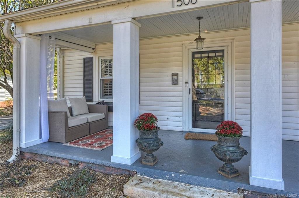 1508 Chippendale Road Charlotte, NC 28205 - Photo 3 of 28 a living room with furniture potted plant and a window