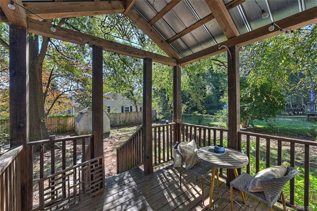 1508 Chippendale Road Charlotte, NC 28205 - Photo 21 of 28 a view of a two chairs in the deck