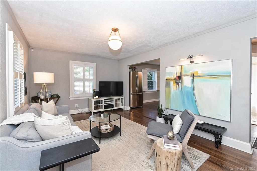 1508 Chippendale Road Charlotte, NC 28205 - Photo 5 of 28 a living room with furniture and a flat screen tv