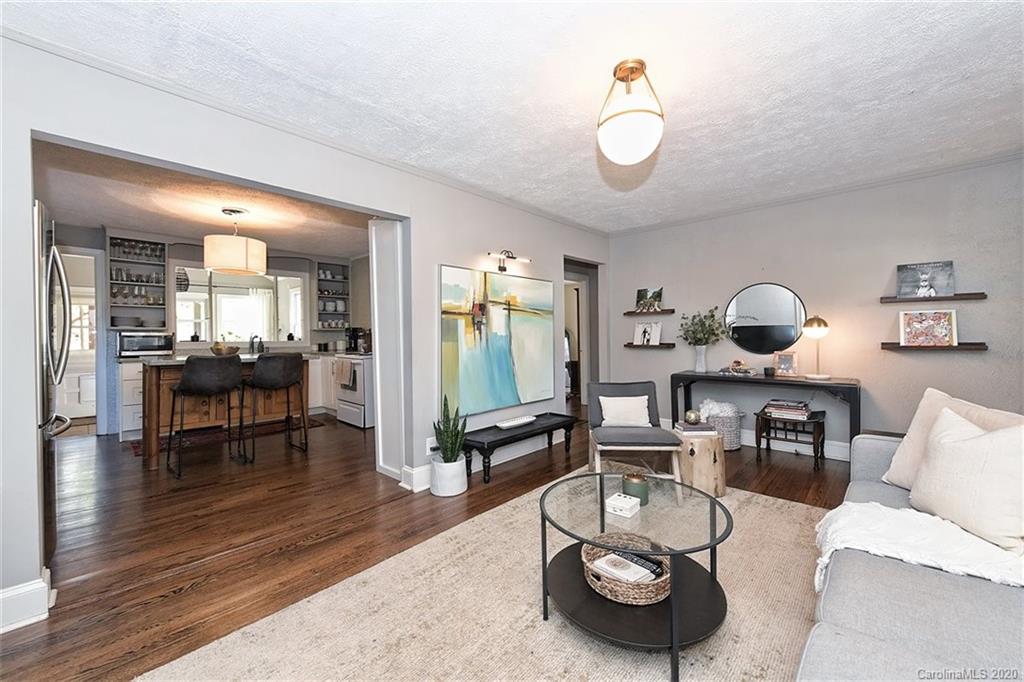 1508 Chippendale Road Charlotte, NC 28205 - Photo 6 of 28 a living room with furniture and a wooden floor