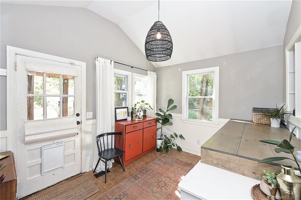 1508 Chippendale Road Charlotte, NC 28205 - Photo 8 of 28 a living room with furniture a wooden floor and a window