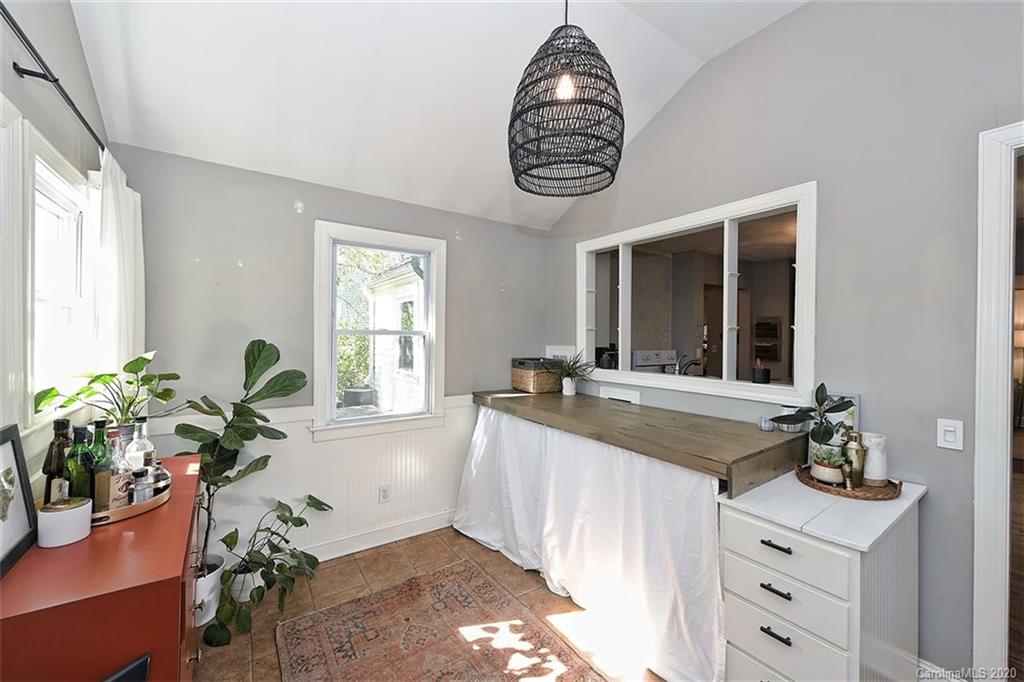 1508 Chippendale Road Charlotte, NC 28205 - Photo 9 of 28 a kitchen with a sink and a stove