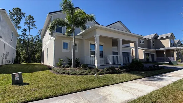 a house view with a garden space