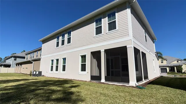 a house view with a backyard space