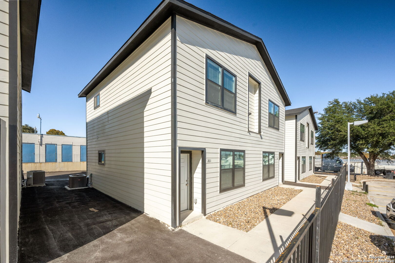 8719 Wurzbach Road, Unit 102 San Antonio, TX 78240 - Photo 14 of 18 a view of backyard of house