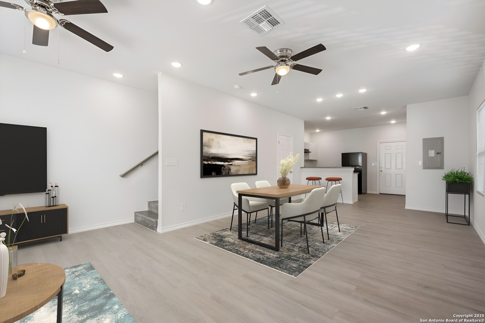 8719 Wurzbach Road, Unit 102 San Antonio, TX 78240 - Photo 2 of 18 a living room with furniture and a flat screen tv