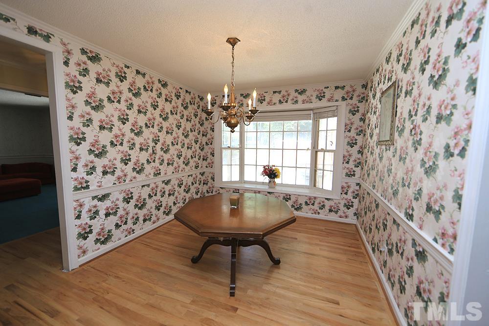 1603 Westhaven Drive Raleigh, NC 27607 - Photo 3 of 30 a view of a room with window and wooden floor