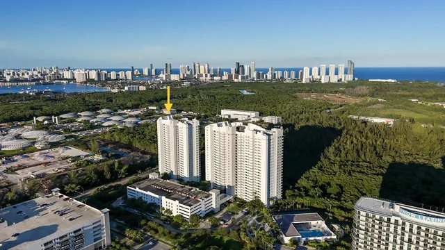 a view of a terrace with lawn chairs