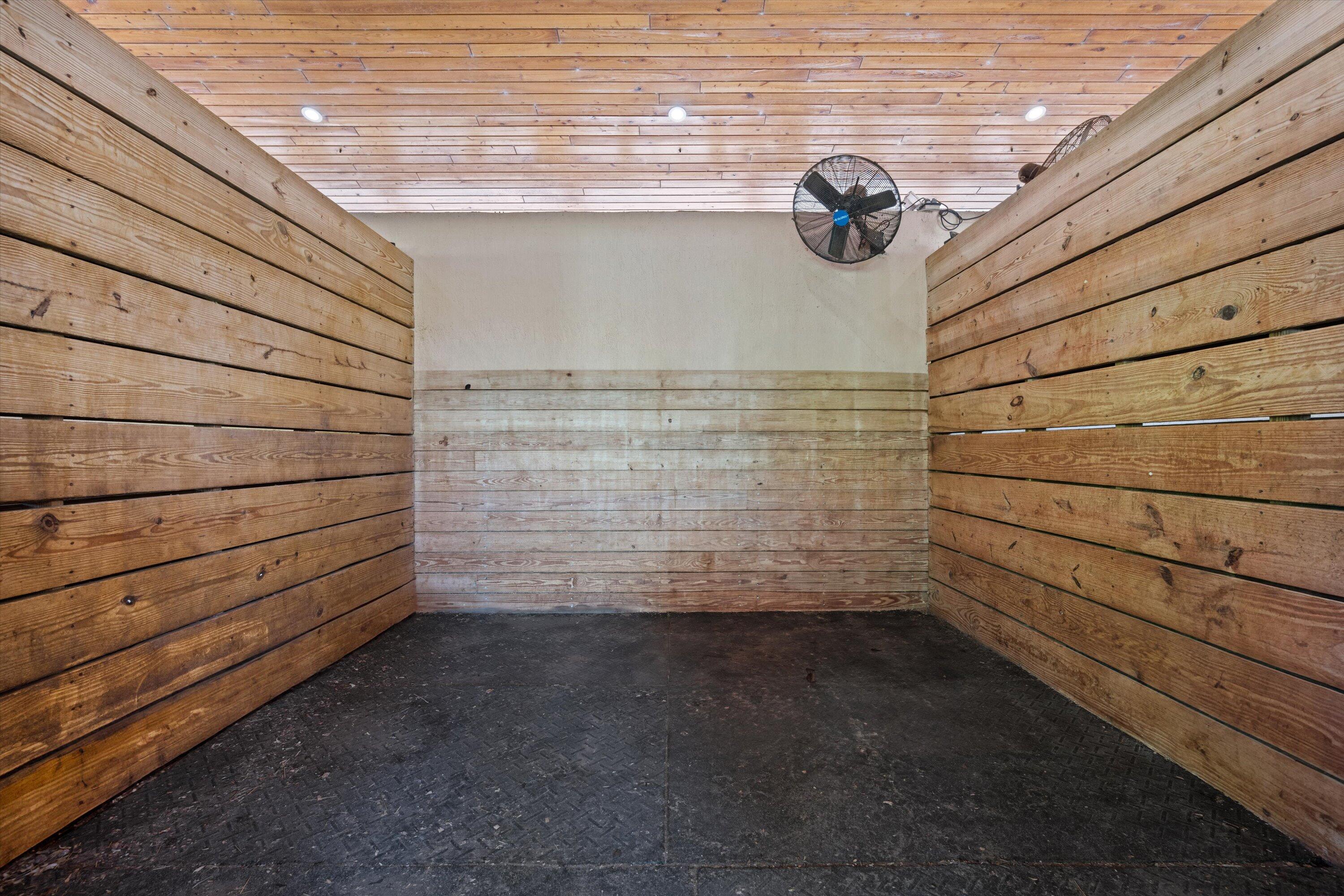 3935 Hanover Circle Loxahatchee, FL 33470 - Photo 13 of 29 a view of racks on the wall