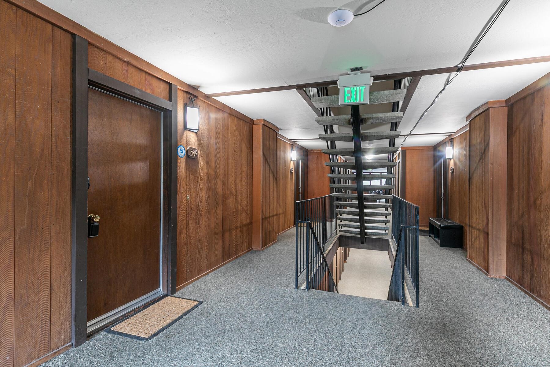 a view of entryway with stairs