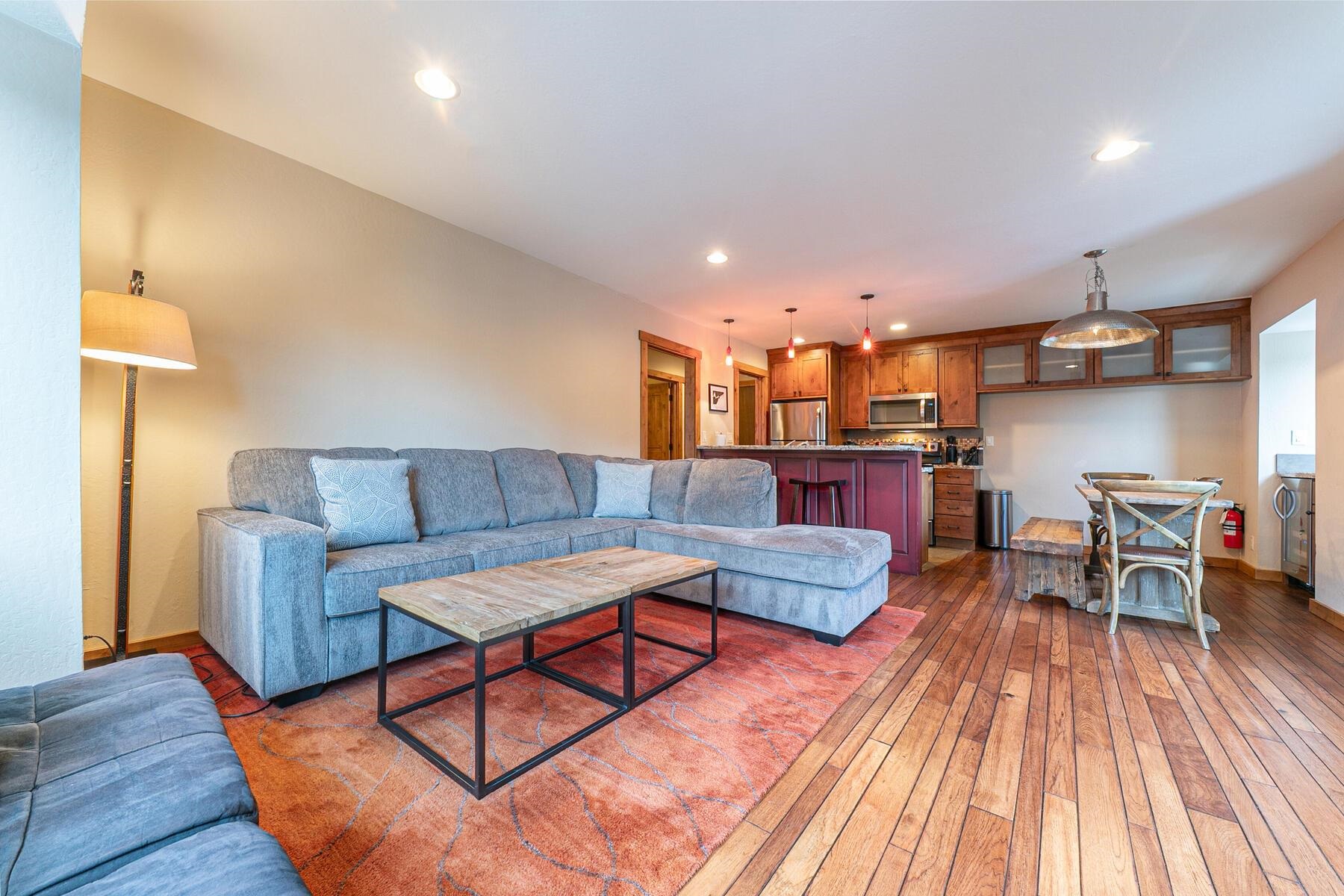 420 Shirley Cyn Road, Unit 34 Olympic Valley, CA 96146 - Photo 12 of 28 a living room with furniture and a wooden floor