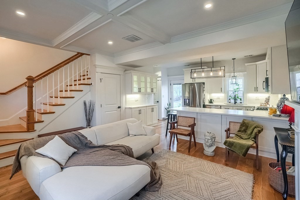 12 South Mason Street, Unit 3 Salem, MA 01970 - Photo 6 of 35 a living room with furniture kitchen view and a wooden floor
