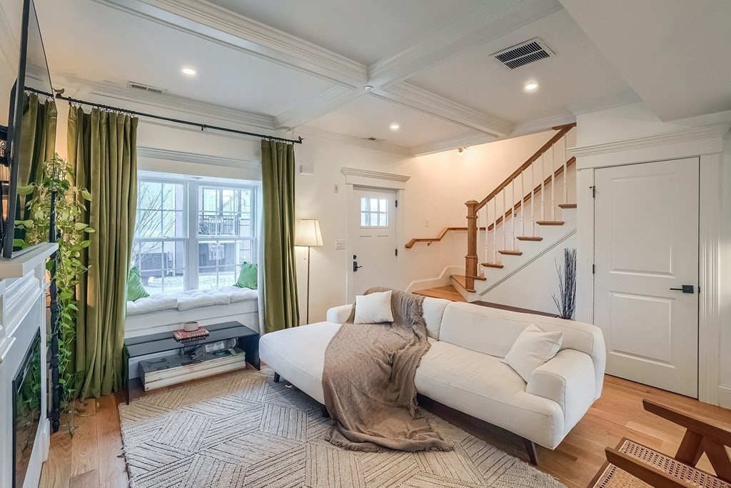 12 South Mason Street, Unit 3 Salem, MA 01970 - Photo 7 of 35 a bedroom with furniture and a large window