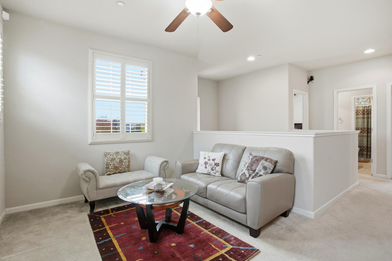 9729 Allen Ranch Way Elk Grove, CA 95757 - Photo 15 of 36 a living room with furniture and a table