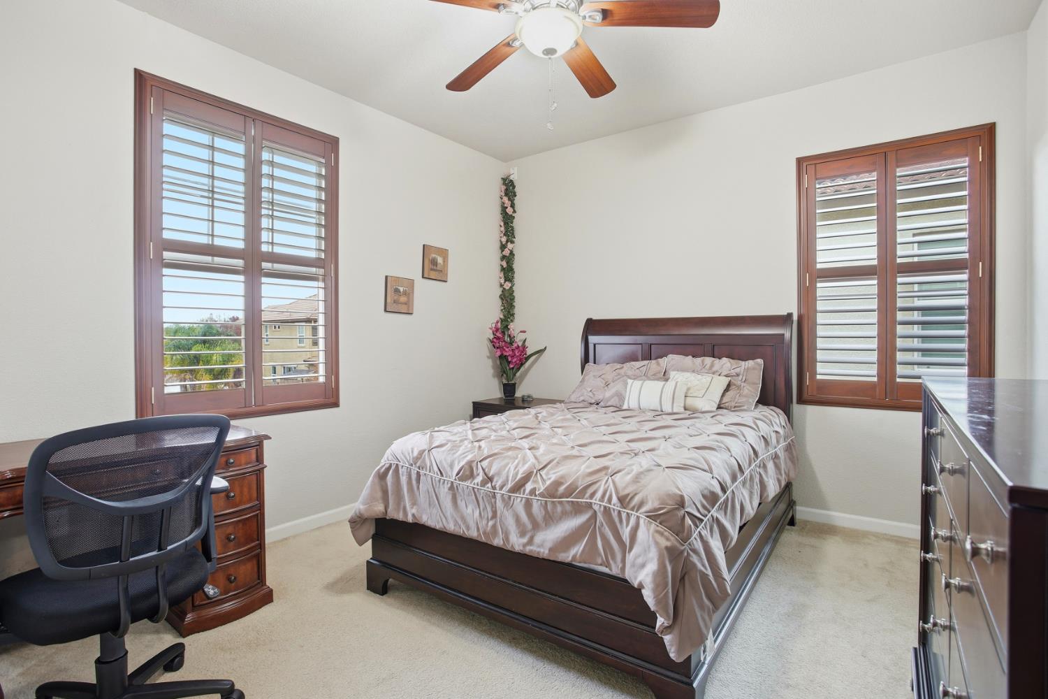 9729 Allen Ranch Way Elk Grove, CA 95757 - Photo 16 of 36 a bedroom with a bed and chair