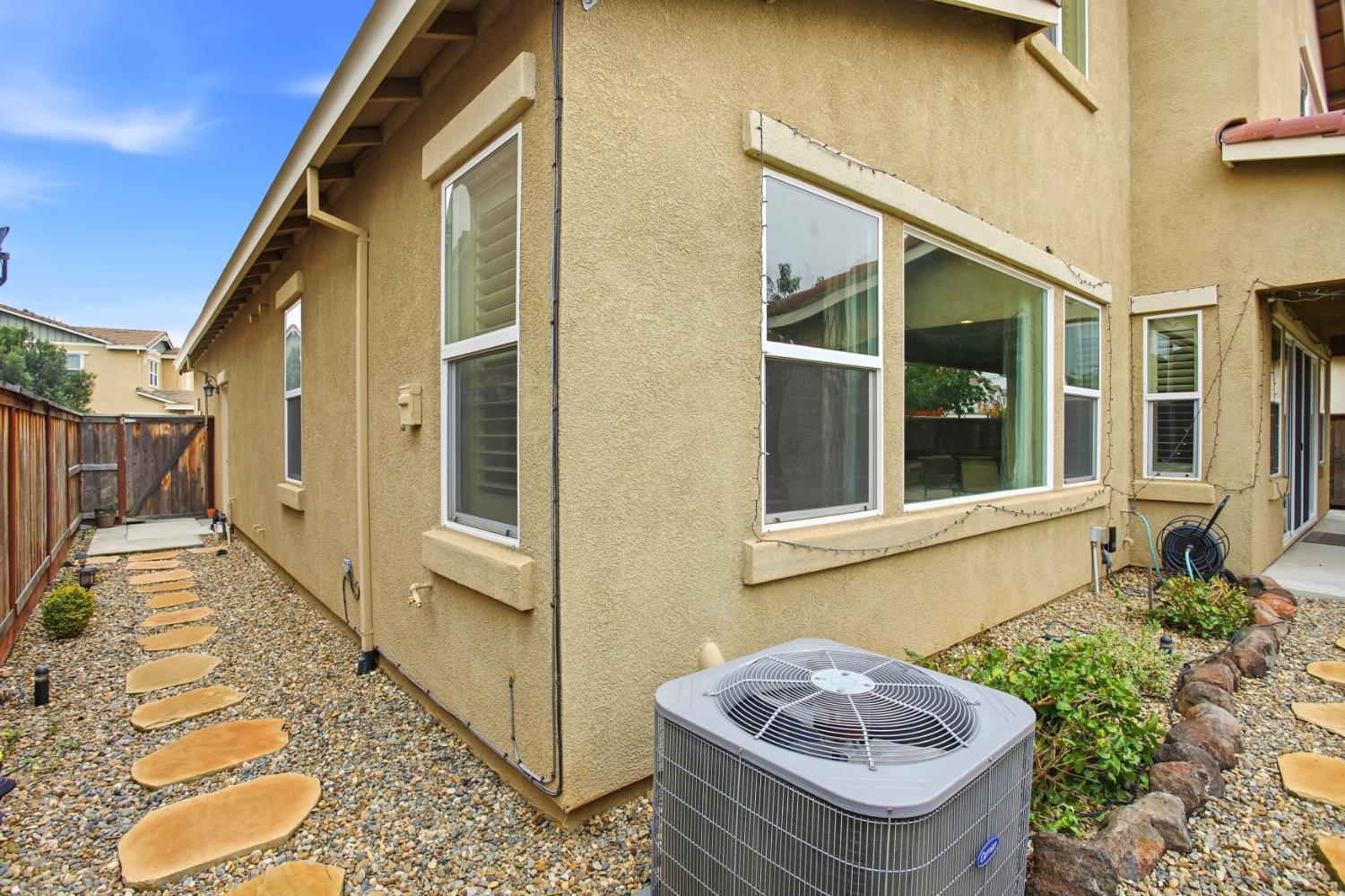 9729 Allen Ranch Way Elk Grove, CA 95757 - Photo 33 of 36 a front view of a house with garden