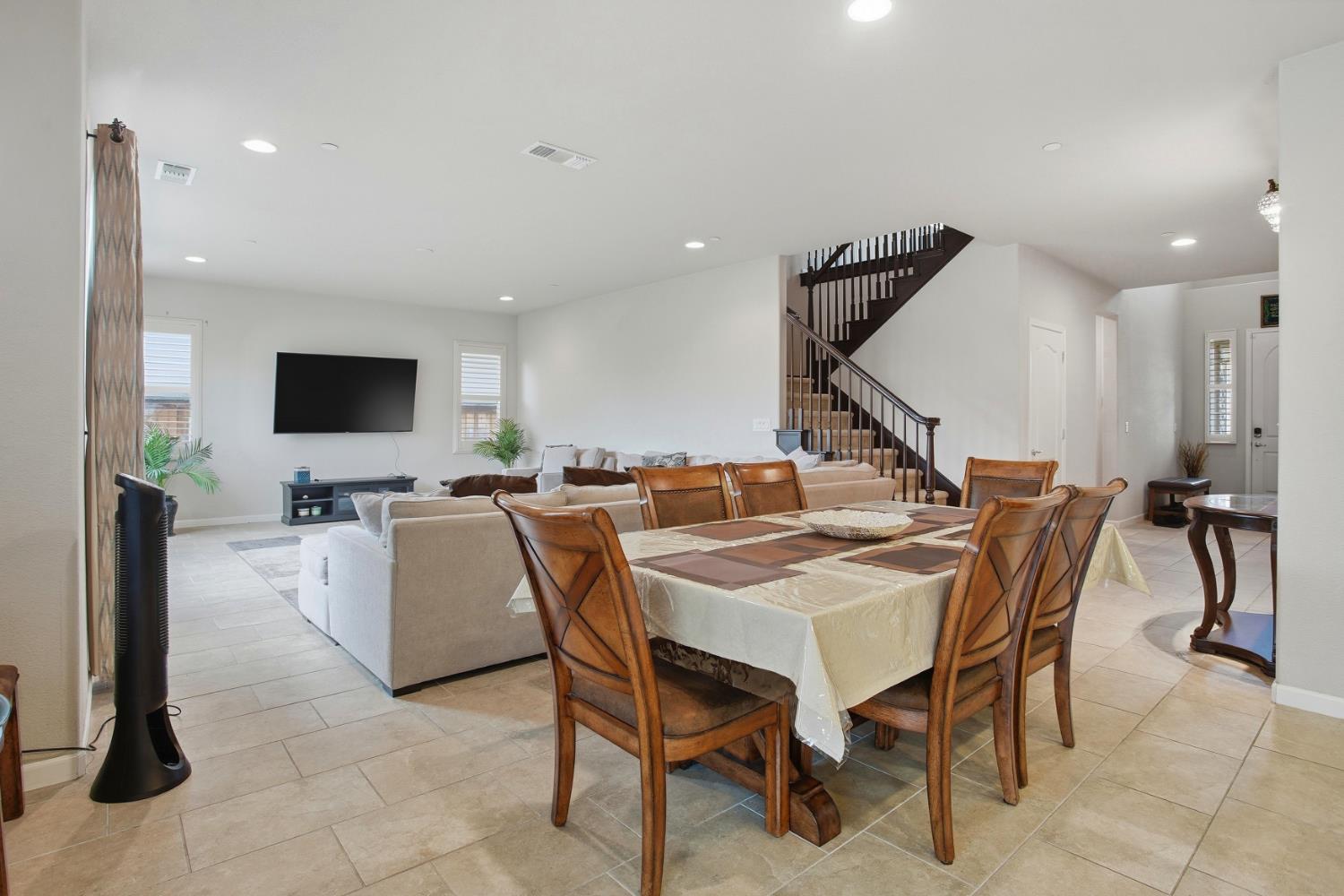 9729 Allen Ranch Way Elk Grove, CA 95757 - Photo 10 of 36 a view of a livingroom with furniture and a flat screen tv