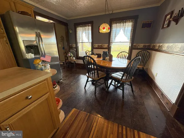 a kitchen with a stove and a refrigerator