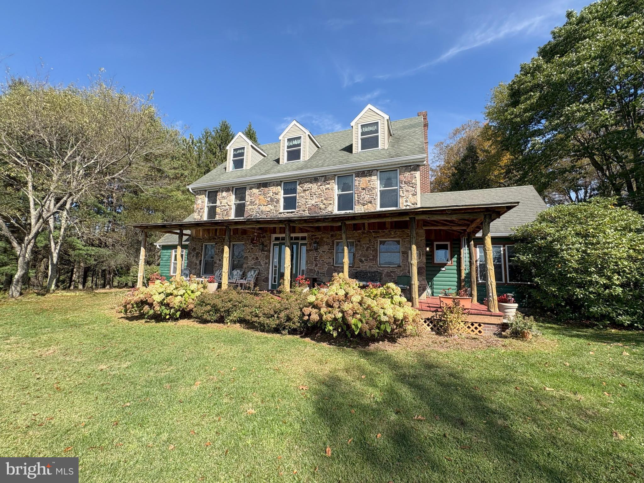 43 Songbird Way Galeton, PA 16922 - Photo 2 of 73 a front view of a house with garden