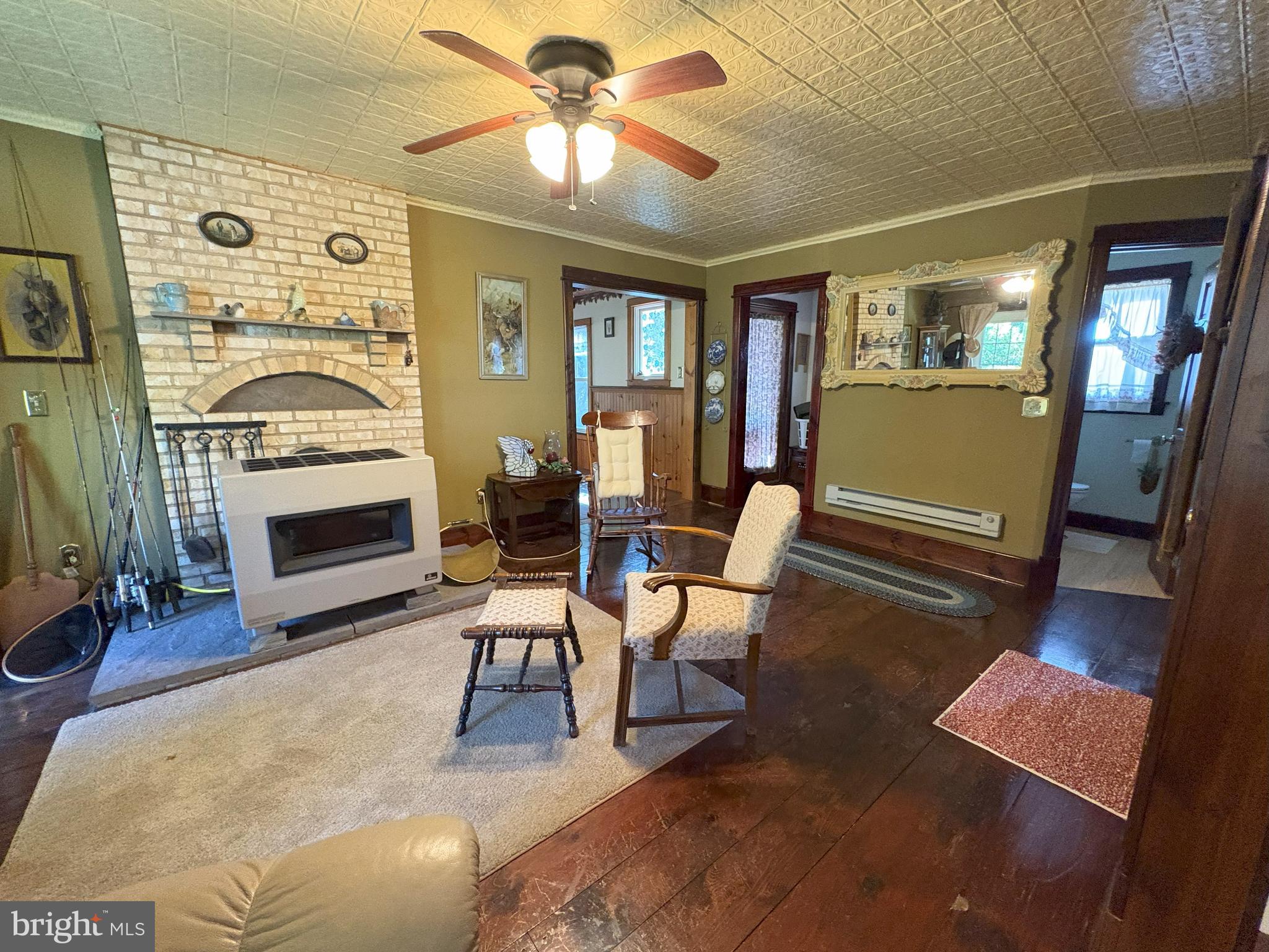 43 Songbird Way Galeton, PA 16922 - Photo 24 of 73 a living room with furniture and a fireplace