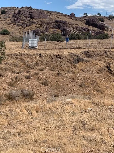 2 Rough Palmdale, CA 93550 - Photo 12 of 22 a view of a dry yard with wooden fence