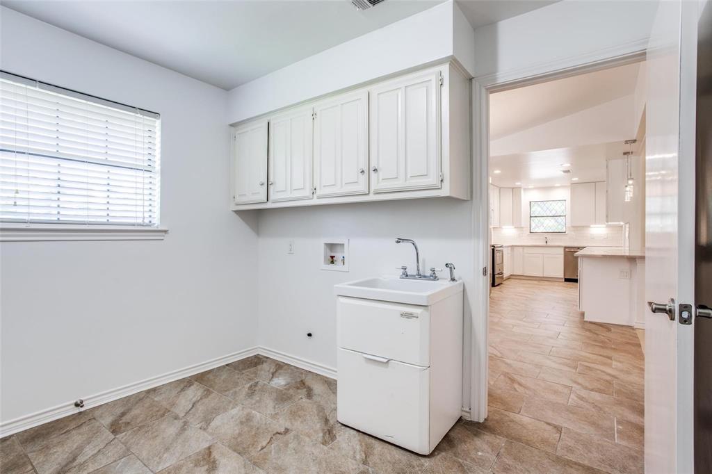 6926 Northwood Road Dallas, TX 75225 - Photo 17 of 29 a view of a kitchen with electric appliances