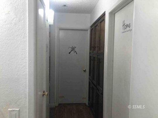 125 South Broadway Street Ridgecrest, CA 93555 - Photo 11 of 24 a bathroom with a shower and a mirror