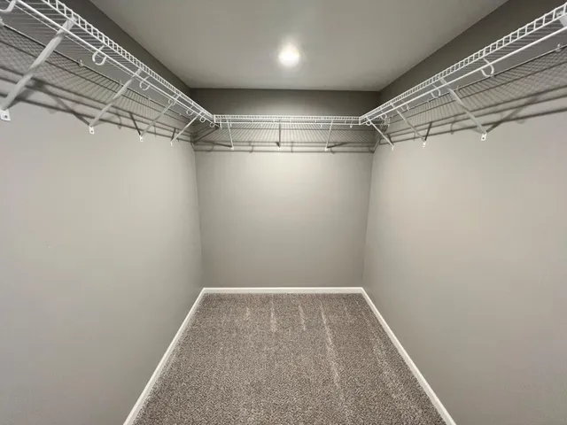 a view of a room with racks on the wall